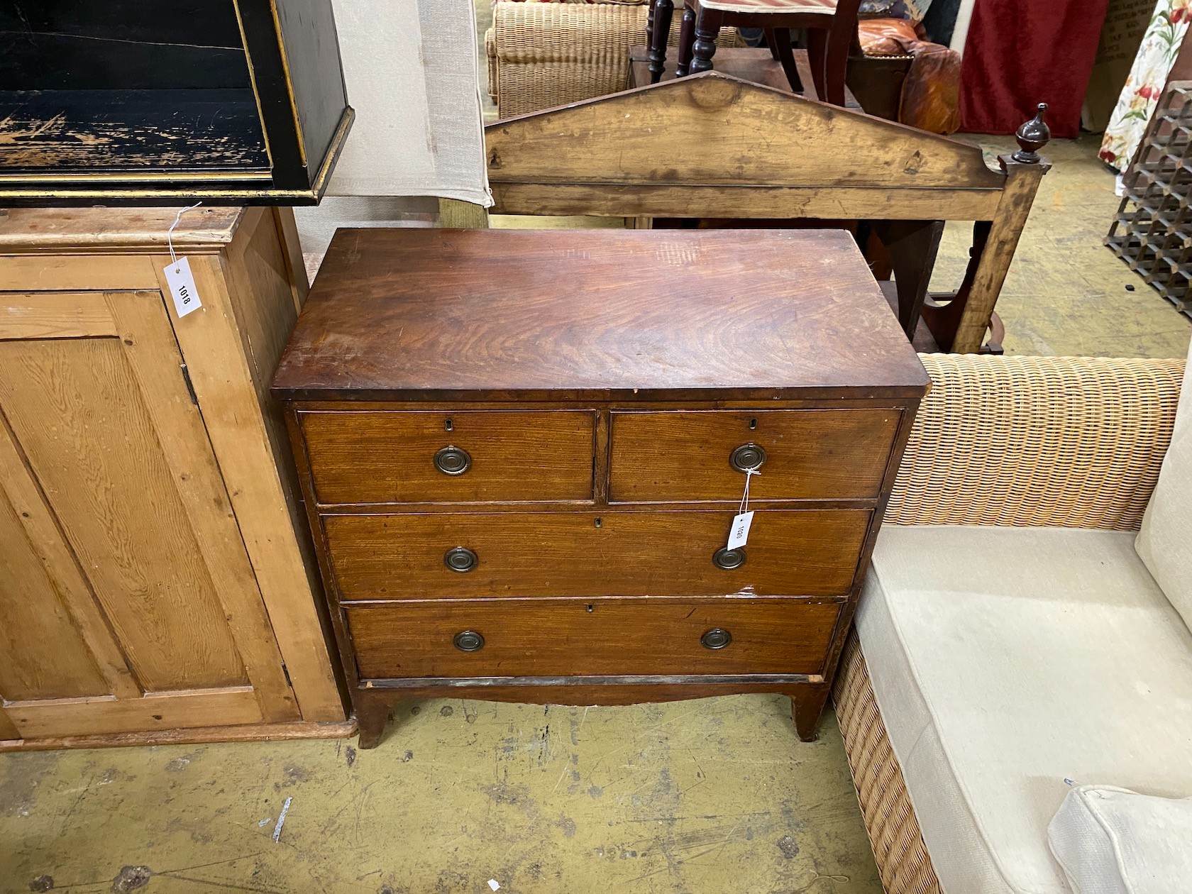 A small early Victorian four drawer chest with original brass ring handles width 89cm, depth 46cm, height 87cm